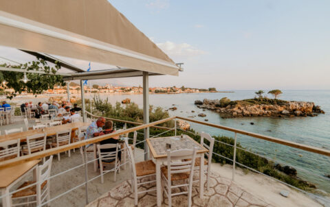 Enigma Cocktail Bar terrace at sunset over the Messenian Bay, Stoupa
