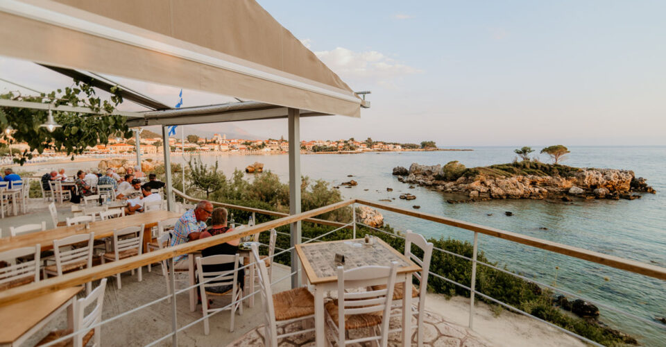 Enigma Cocktail Bar terrace at sunset over the Messenian Bay, Stoupa