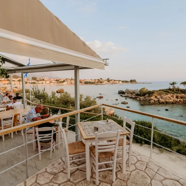Enigma Cocktail Bar terrace at sunset over the Messenian Bay, Stoupa